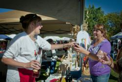 A guest samples a local creation at the annual Oakhurst Fall Festival